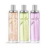 Packshot des Starlicious Yummy Swirl Layering-Bundle mit Pineapple Musk, Pistachio Praline und Berry Licorice: Glasflakons mit eingravierter Sternschnuppe, deren Facetten unter einer eleganten silberfarbenen Kappe strahlen.